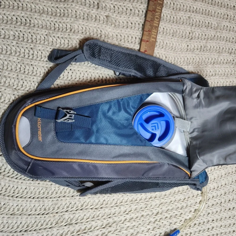 NWOT 2L Water Outdoor Prod Bladder Bag Hydration Backpack Hiking Camping Cycling